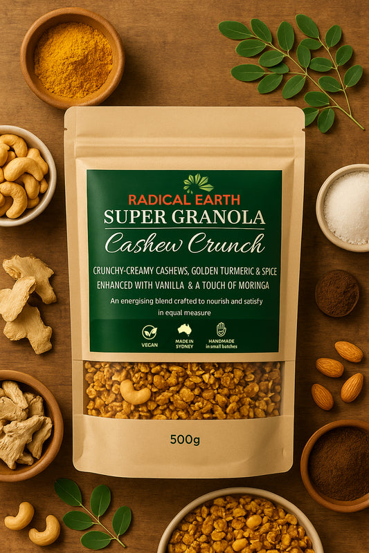 Cashew Crunch granola clusters with cashews, millet, and warm spice.